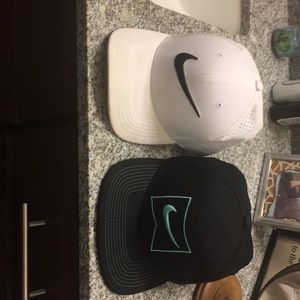 2 Nike hats